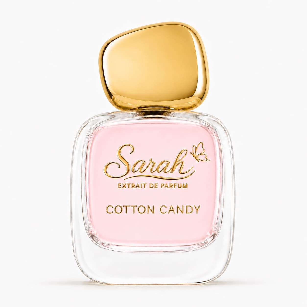 Perfume bottle with gold cap and pink label on a white background