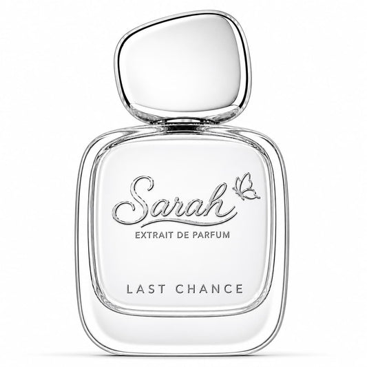 Clear perfume bottle labeled 'Sarah Extrait de Parfum Last Chance' on a white background
