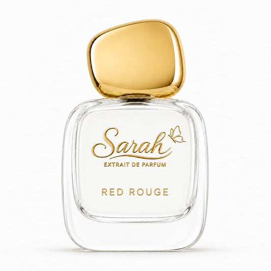 Perfume bottle labeled 'Sarah Extrait de Parfum Red Rouge' with a gold cap on a white background