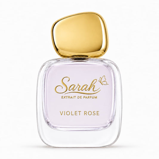 Perfume bottle labeled 'Sarah Extrait de Parfum Violet Rose' with a gold cap on a white background